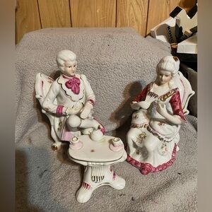 Elegant Porcelain Figurine Set with Pink Accents